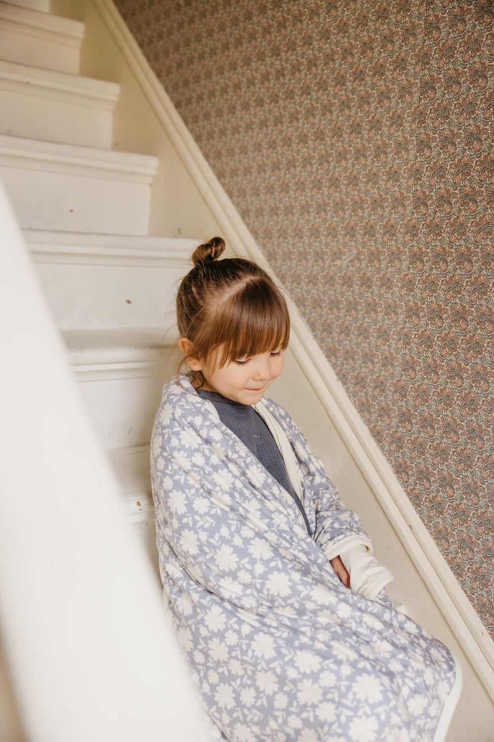 Copper Pearl Lacie blanket spread on a toddler bed for comfy naps.