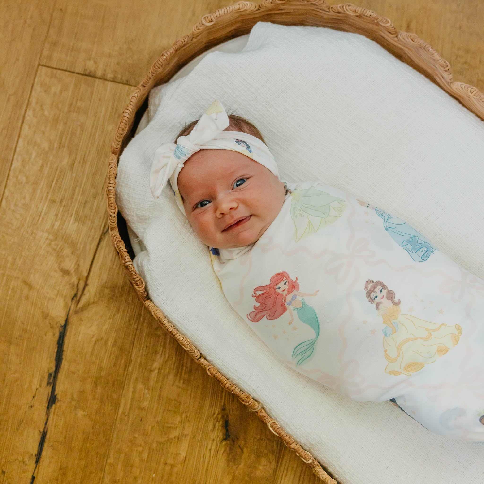 Copper Pearl Disney Princess knit swaddle with serged edge detail