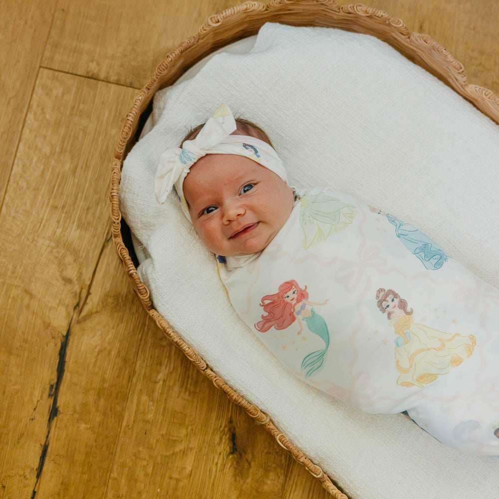 Copper Pearl Disney Princess knit swaddle with serged edge detail