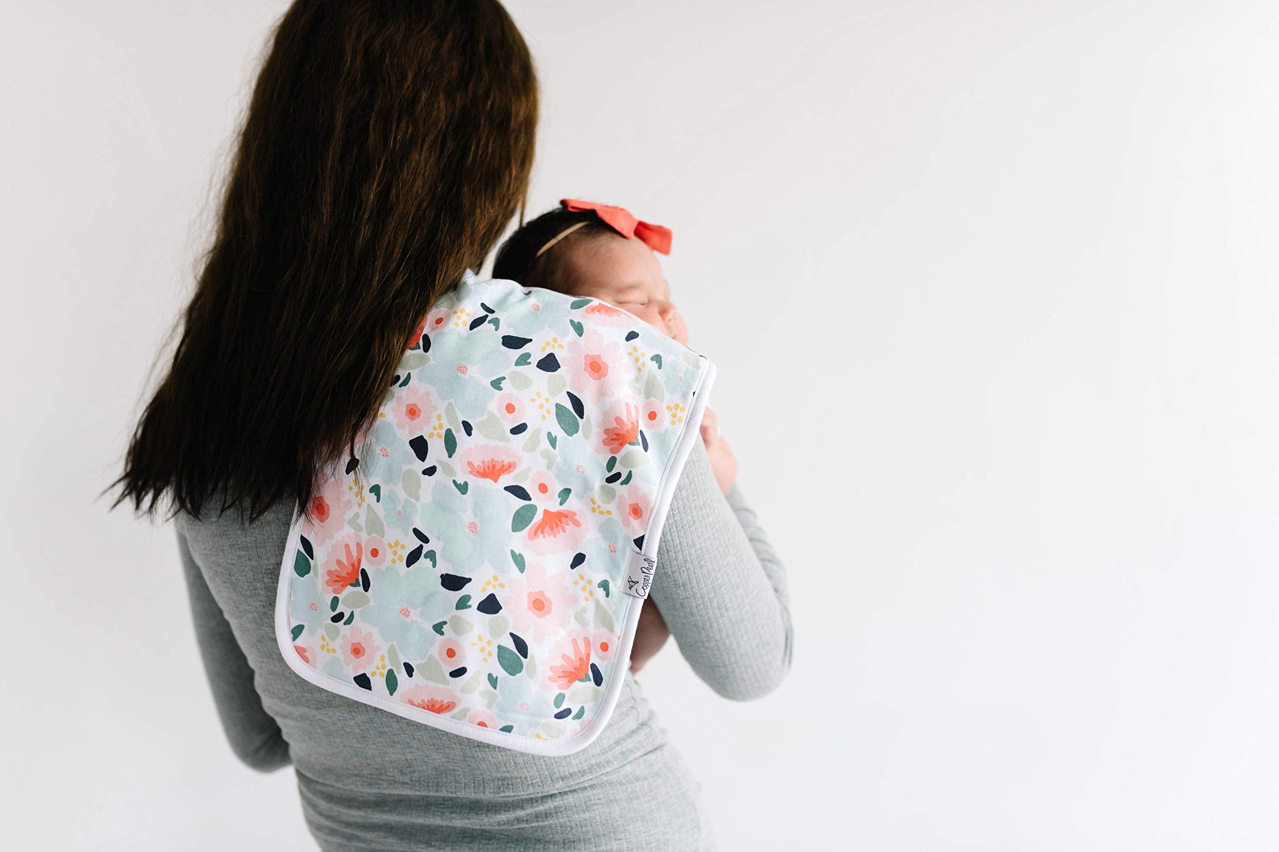 Copper Pearl Leilani burp cloths oversized 21x10 inches for extra coverage.