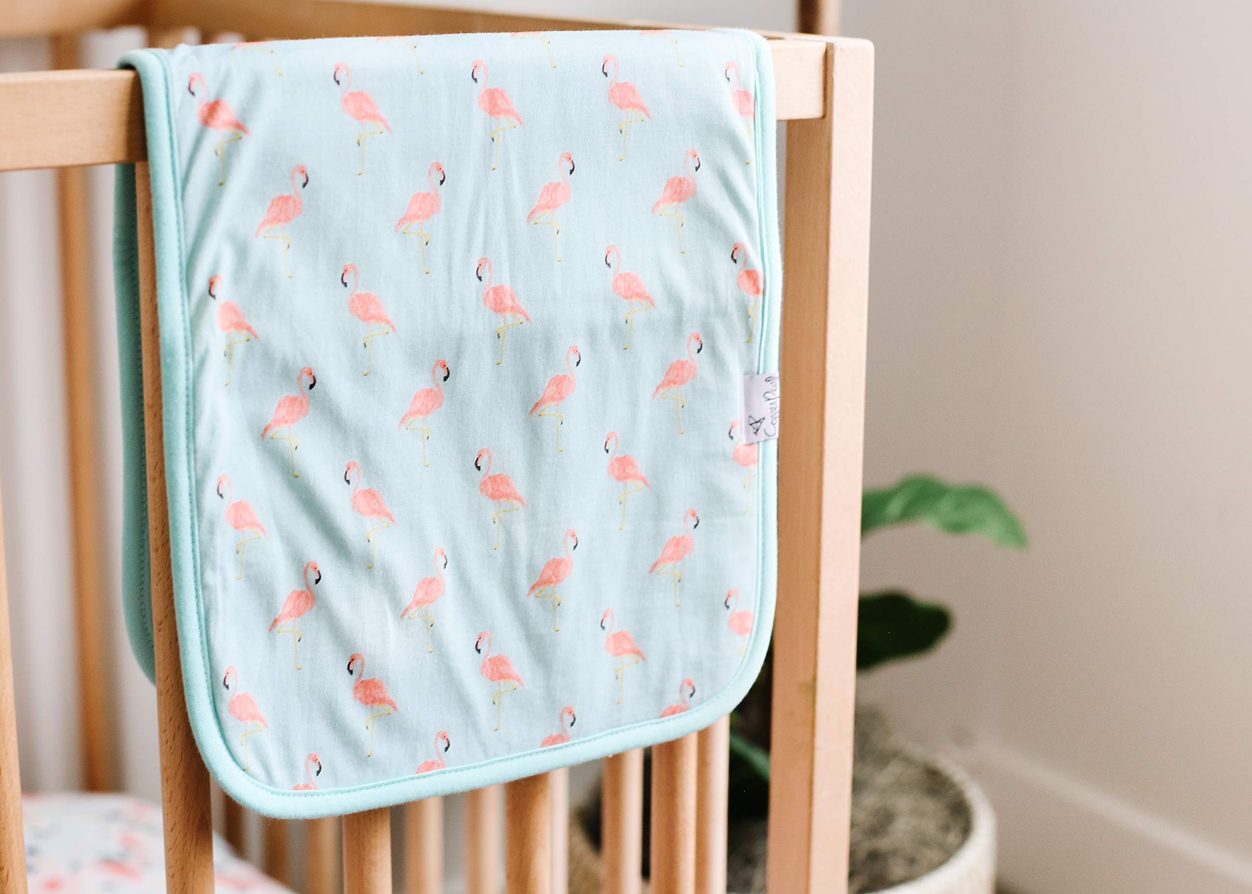 Copper Pearl Leilani burp cloths patterned front and white back.