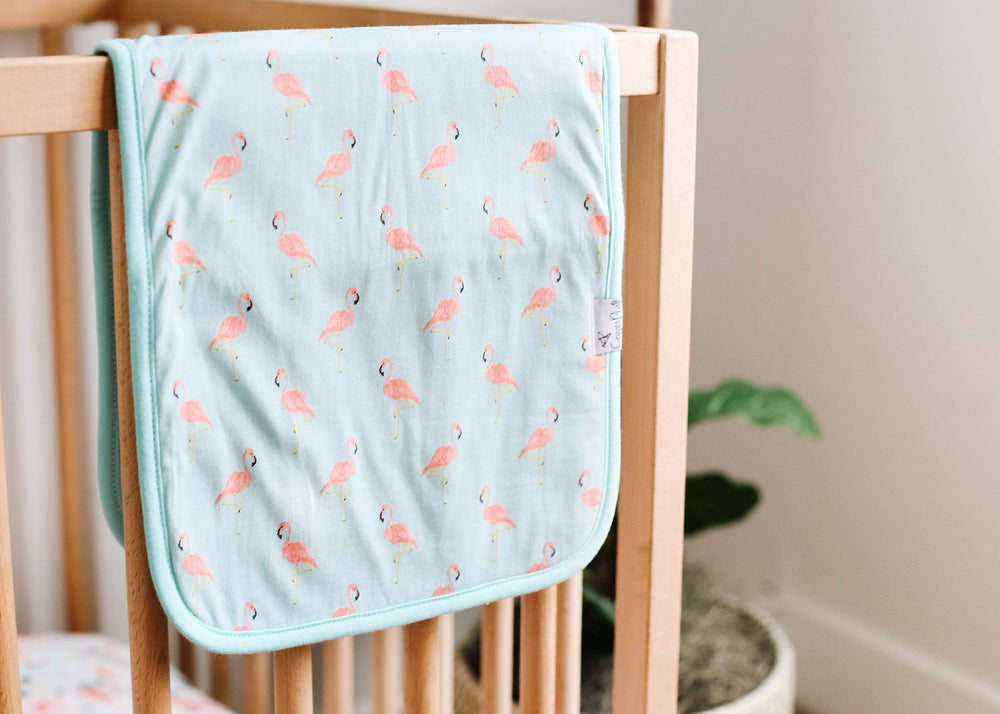 Copper Pearl Leilani burp cloths patterned front and white back.