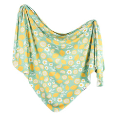Copper Pearl Lemon swaddle blanket shows soft-knit texture for newborn comfort