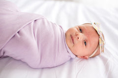 Copper Pearl Lily blanket with fashionable Lily print complements Copper Pearl essentials.