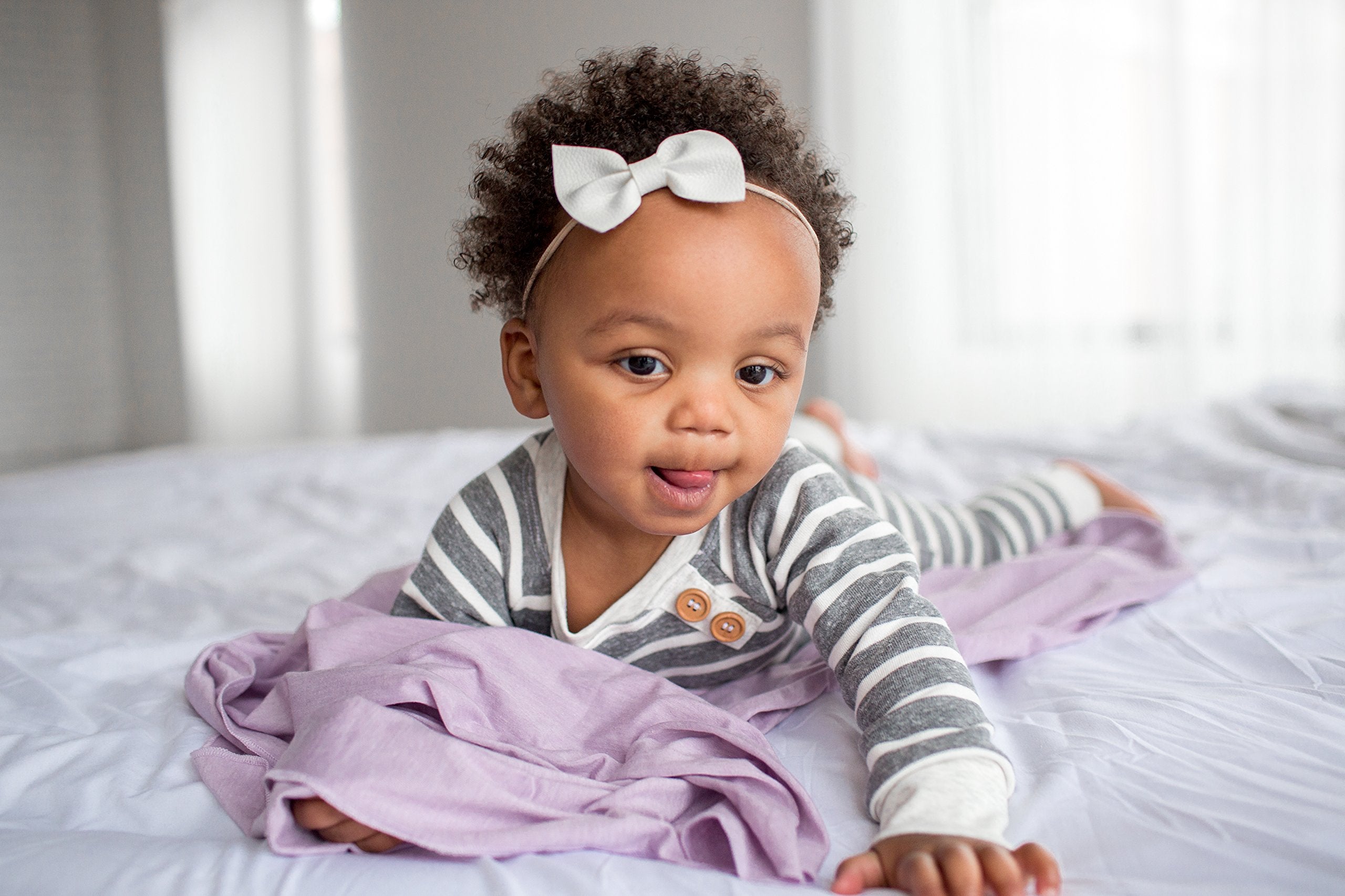 Copper Pearl Lily blanket keeps baby cozy without bulk for everyday use.