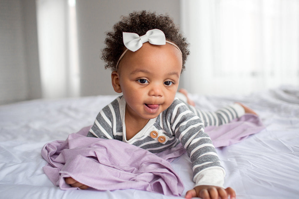 Copper Pearl Lily blanket keeps baby cozy without bulk for everyday use.