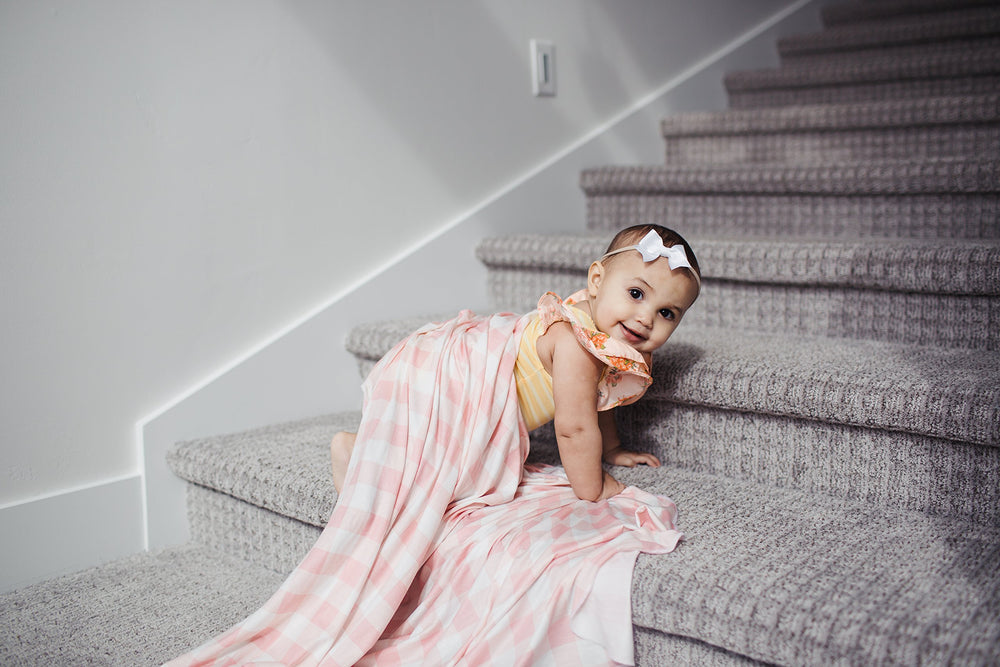 Copper Pearl London breathable fabric detail emphasizes light, airy coverage for baby comfort