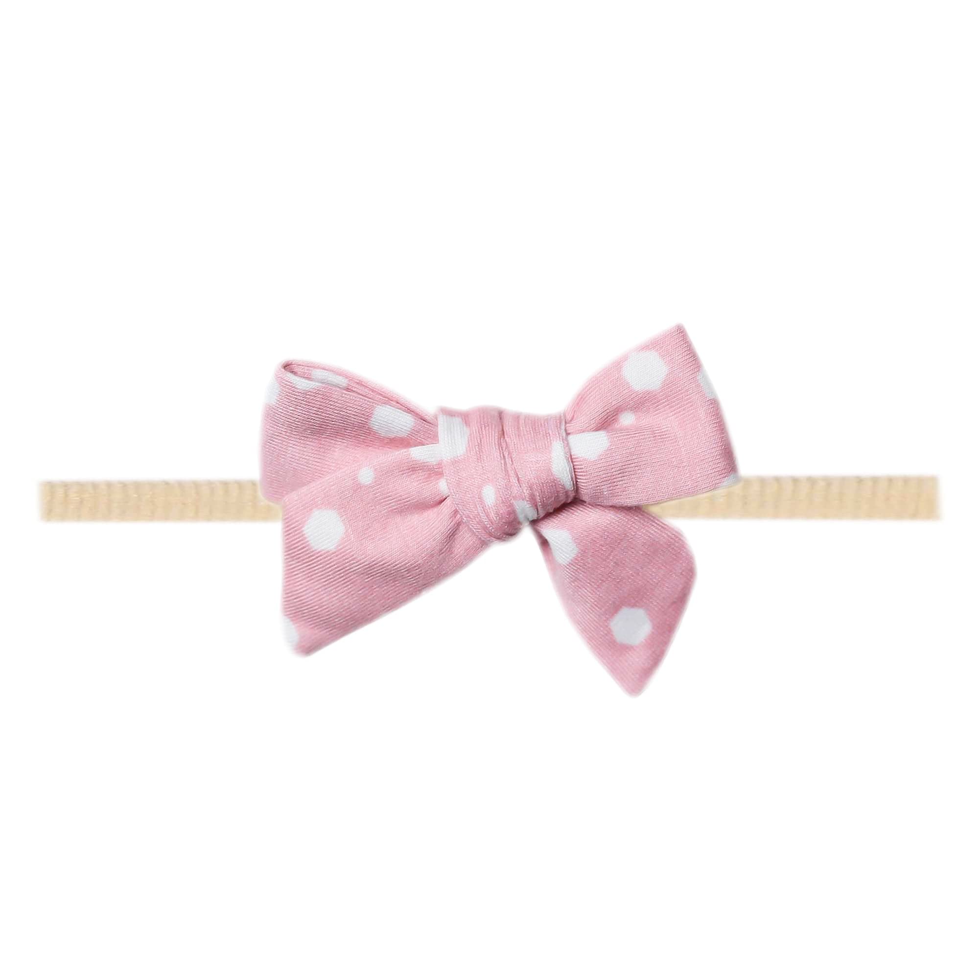 Copper Pearl Lucy Classic baby bow front view, soft fabric for newborn comfort