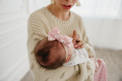 Copper Pearl Lucy Classic bow coordinated with outfits for a cohesive look