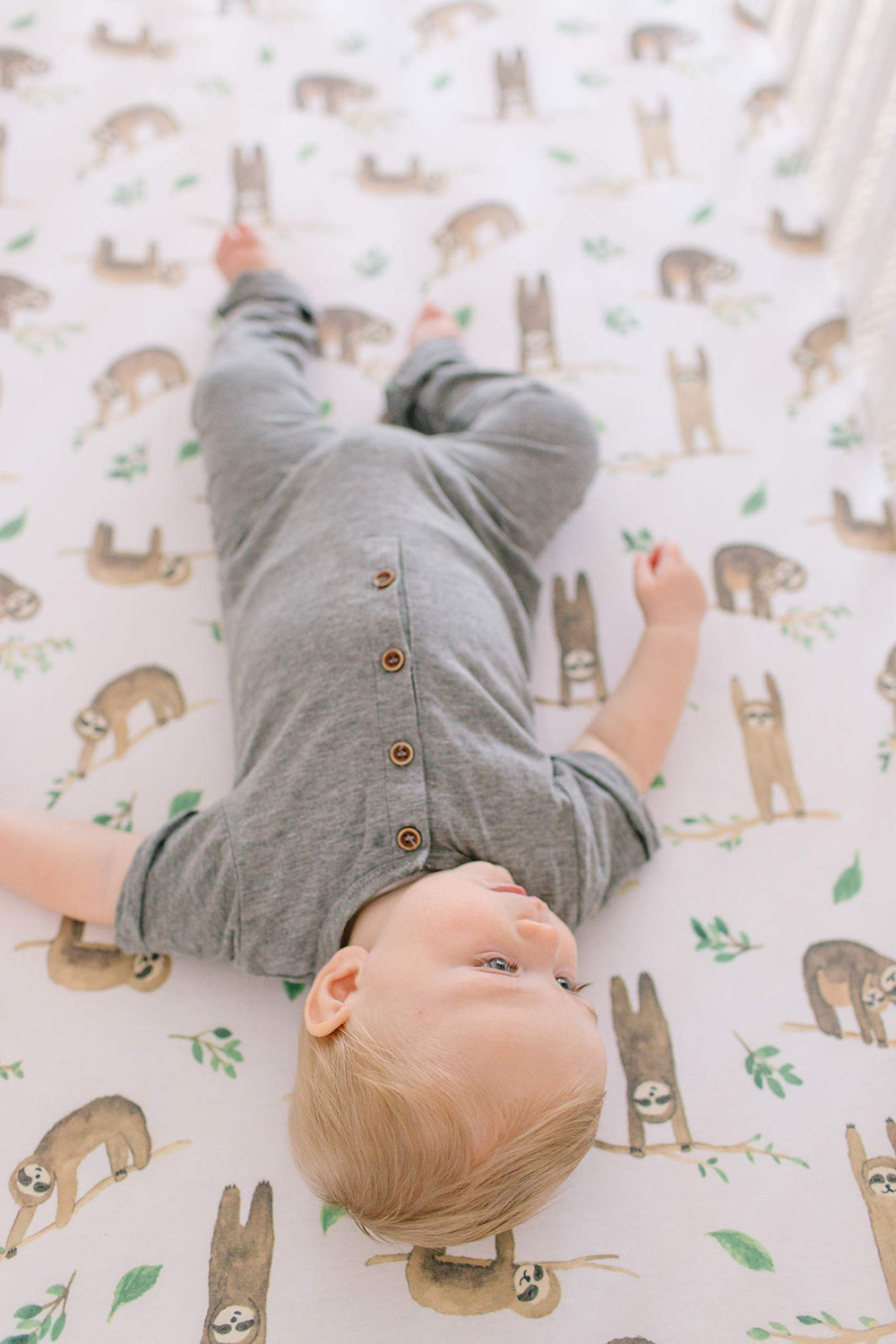 Copper Pearl machine-washable crib sheet close-up emphasizes easy cleaning for busy parents