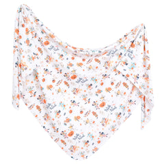 Copper Pearl Mickey Boo Bash swaddle blanket offers breathable warmth and cozy snuggles.