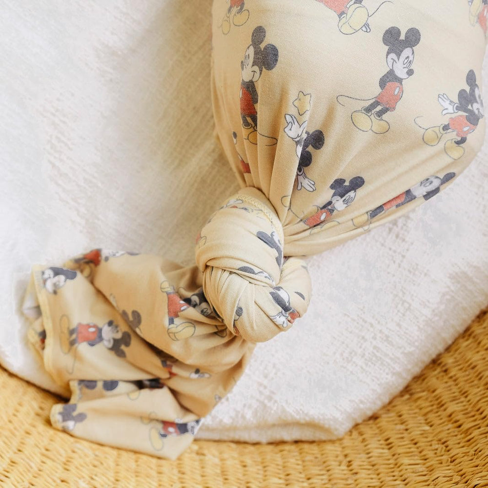 Serged edges detail on Copper Pearl Mickey swaddle for durable, tidy finish.