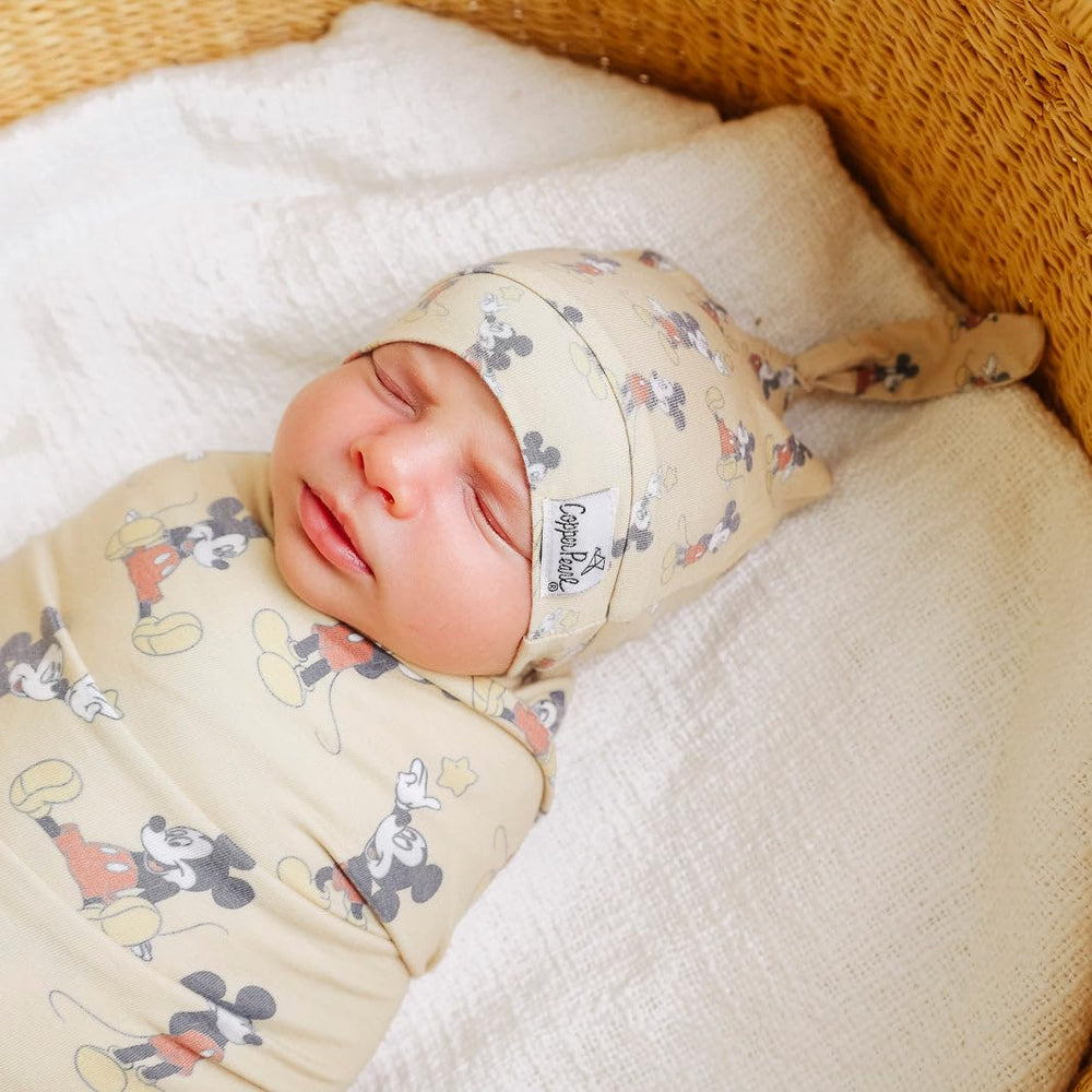 Lightweight and breathable Copper Pearl swaddle offers cozy comfort.
