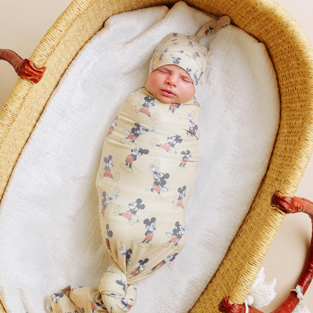 Copper Pearl Mickey swaddle with modern design fits nursery styling.