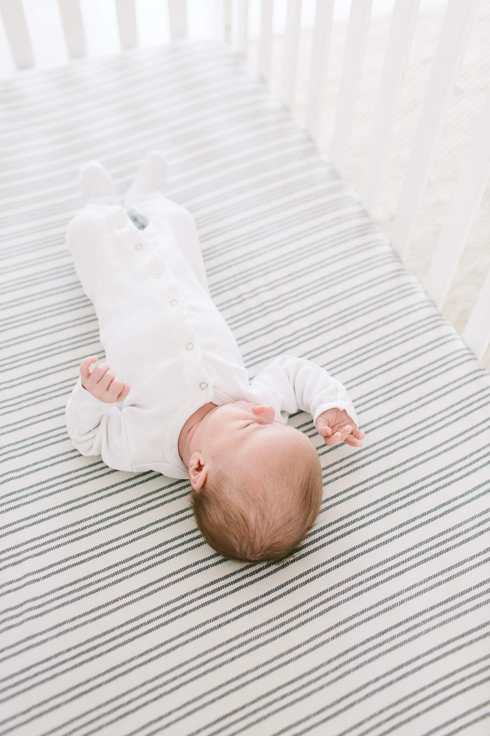 Copper Pearl Midtown knit crib sheet breathable material supports temperature control