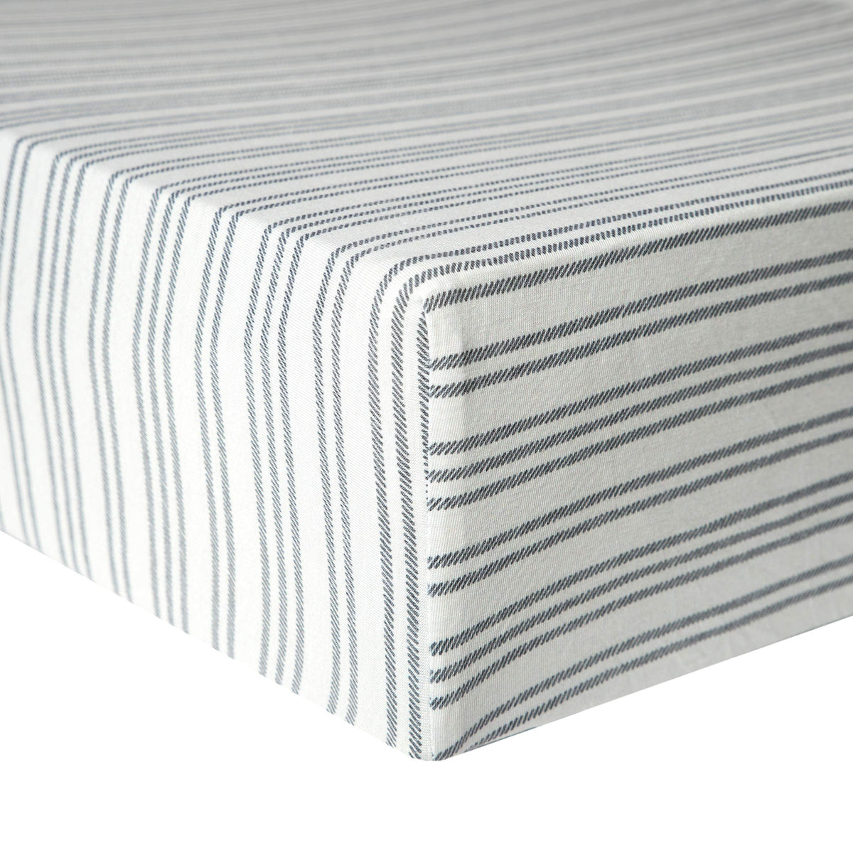 Copper Pearl Midtown knit crib sheet closeup shows soft breathable fabric for comfort
