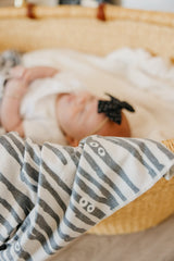Copper Pearl modern design gift-ready blanket adds style to baby gear