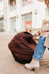 Copper Pearl Moose shopping cart cover protects baby from shared germs.
