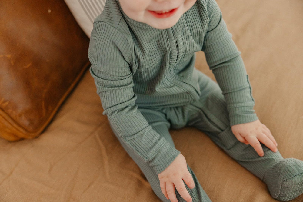 Copper Pearl moss color adds earthy tone to baby outfits.
