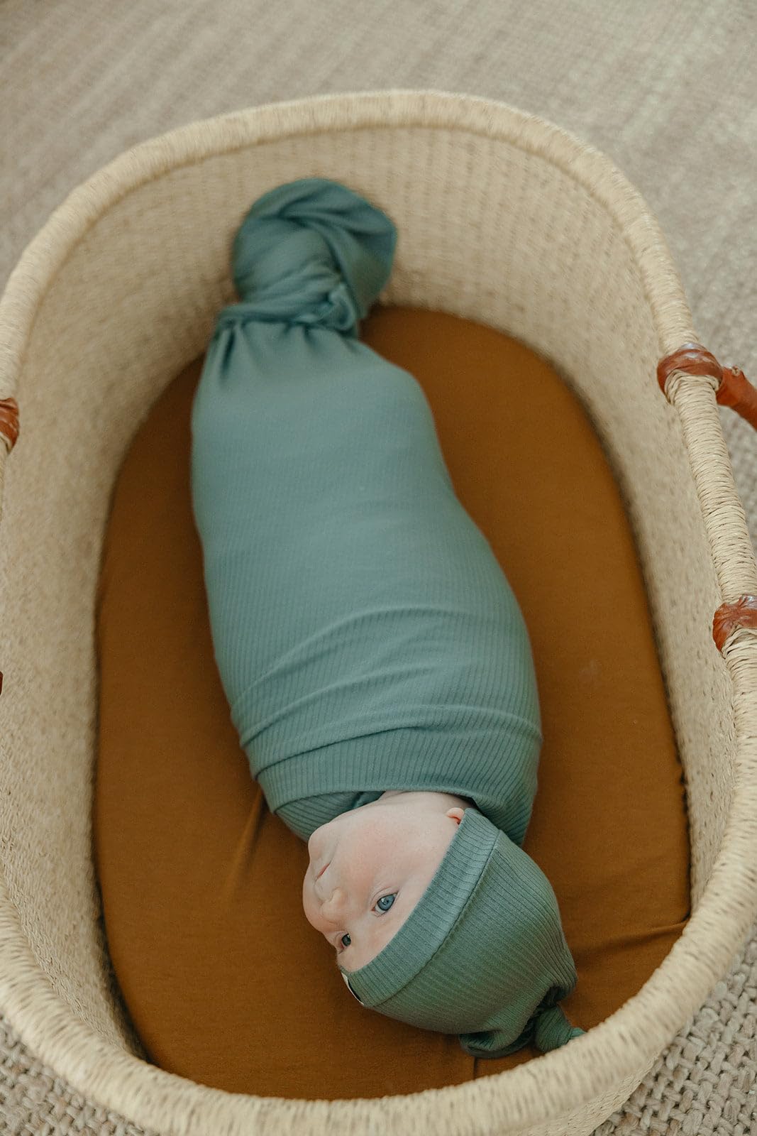 Copper Pearl Moss swaddle blanket makes a gift-ready baby essential.