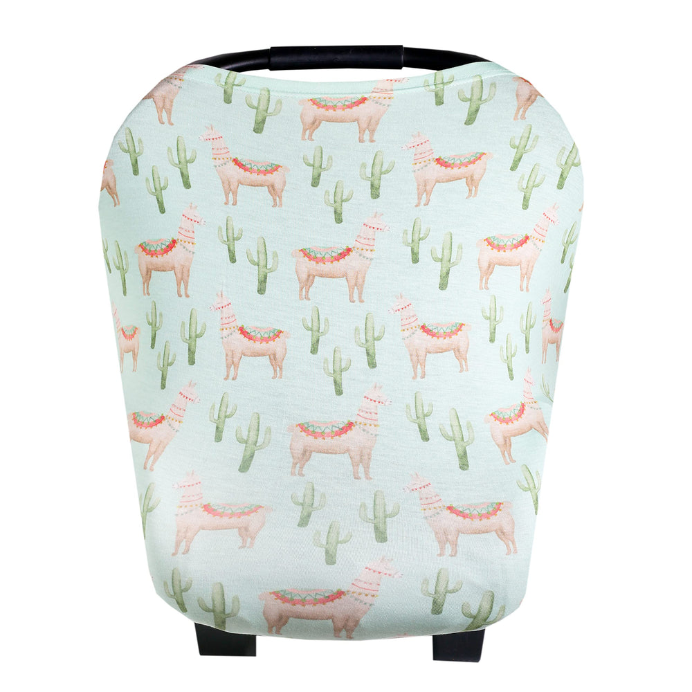 Copper Pearl multi-use cover as a car seat cover provides sun protection and easy breastfeeding access.
