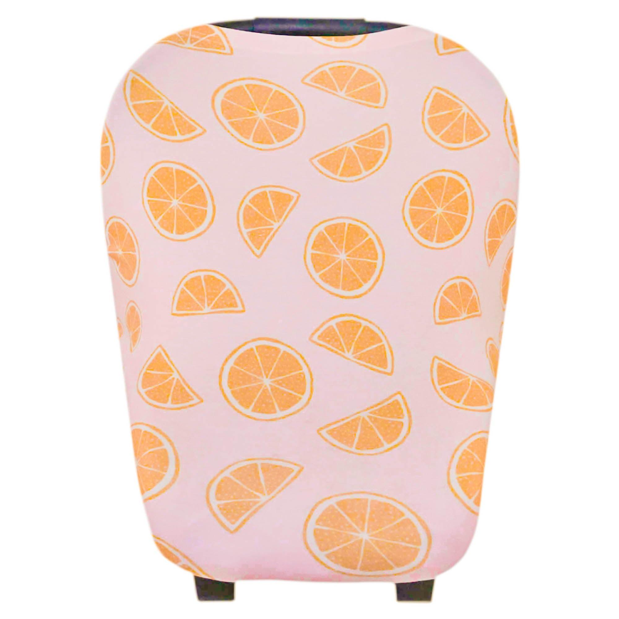 Copper Pearl multi-use cover on car-seat shielding baby from sun