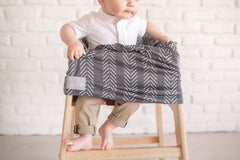 Copper Pearl multi-use cover shopping-cart cover keeps baby comfy and clean during errands.