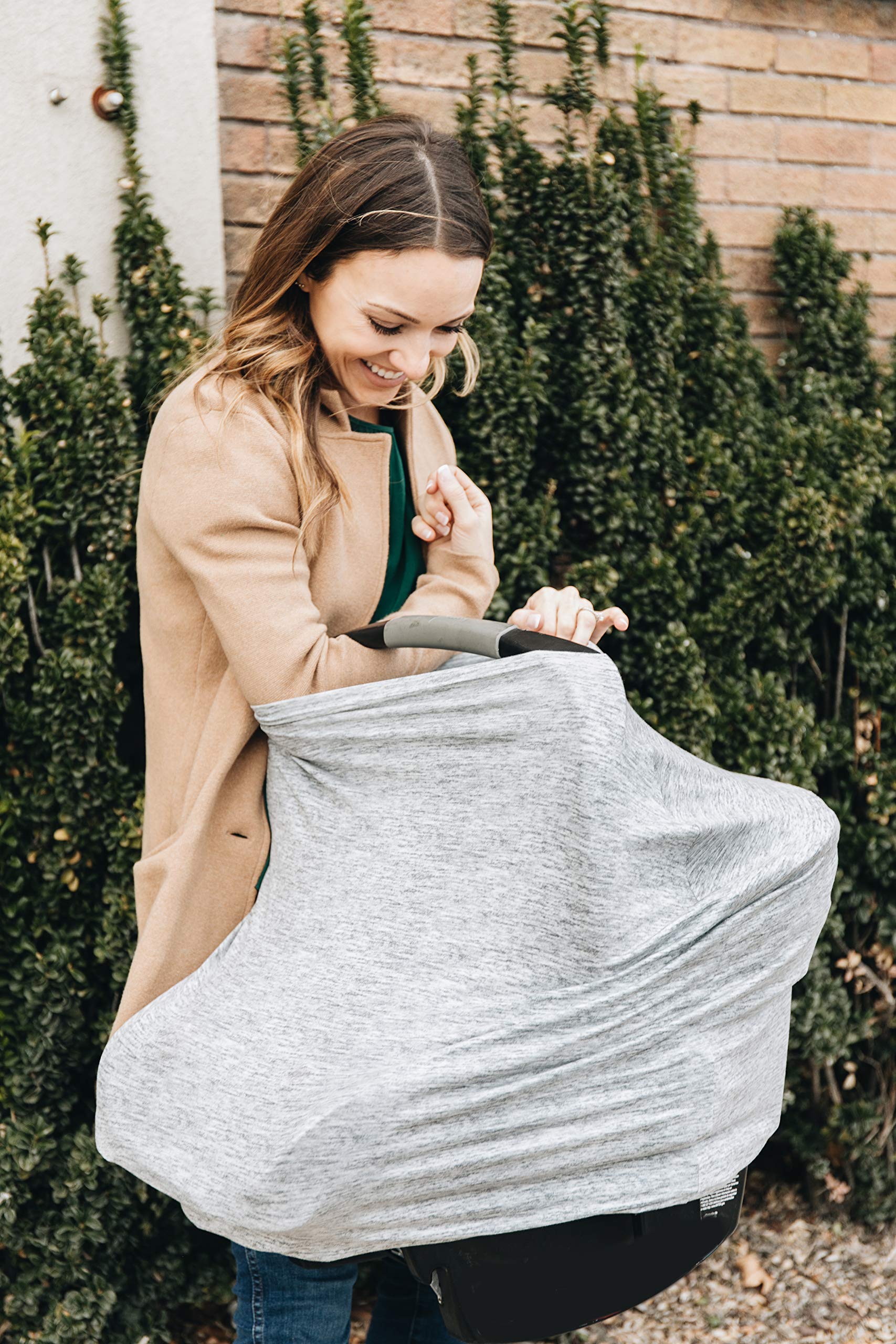Copper Pearl shopping-cart cover; spacious, easy to wipe, keeps baby comfortable in stores