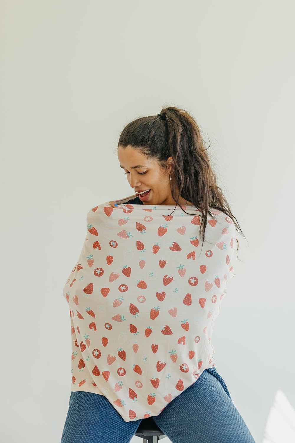 Copper Pearl multi-use cover stroller cover shields baby from sun while you stroll.