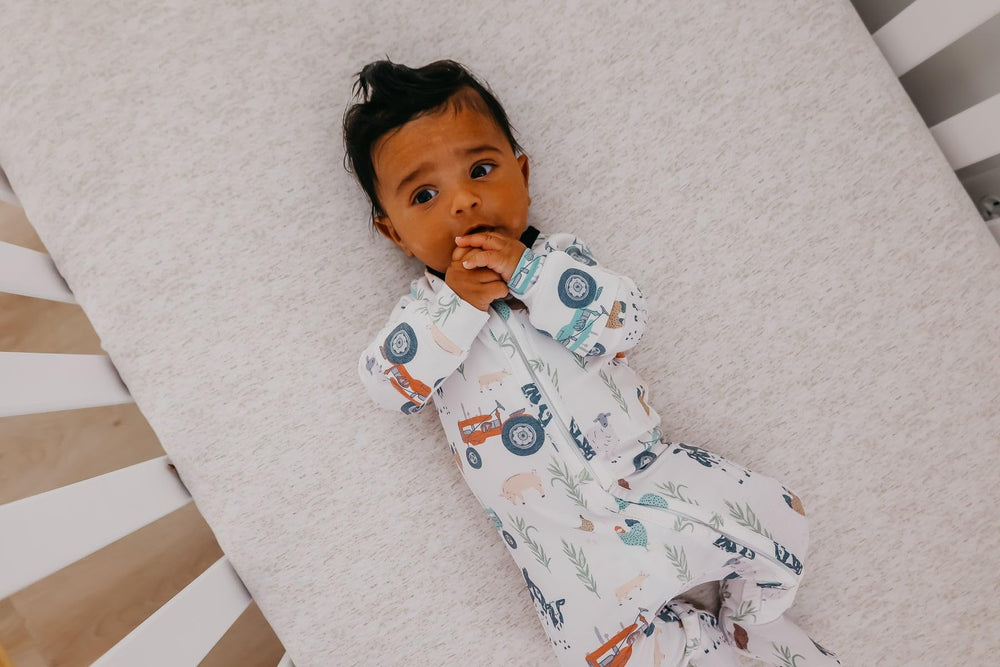 Copper Pearl newborn size 0-3 months, stretchy fabric fits tiny babies for comfortable sleep.