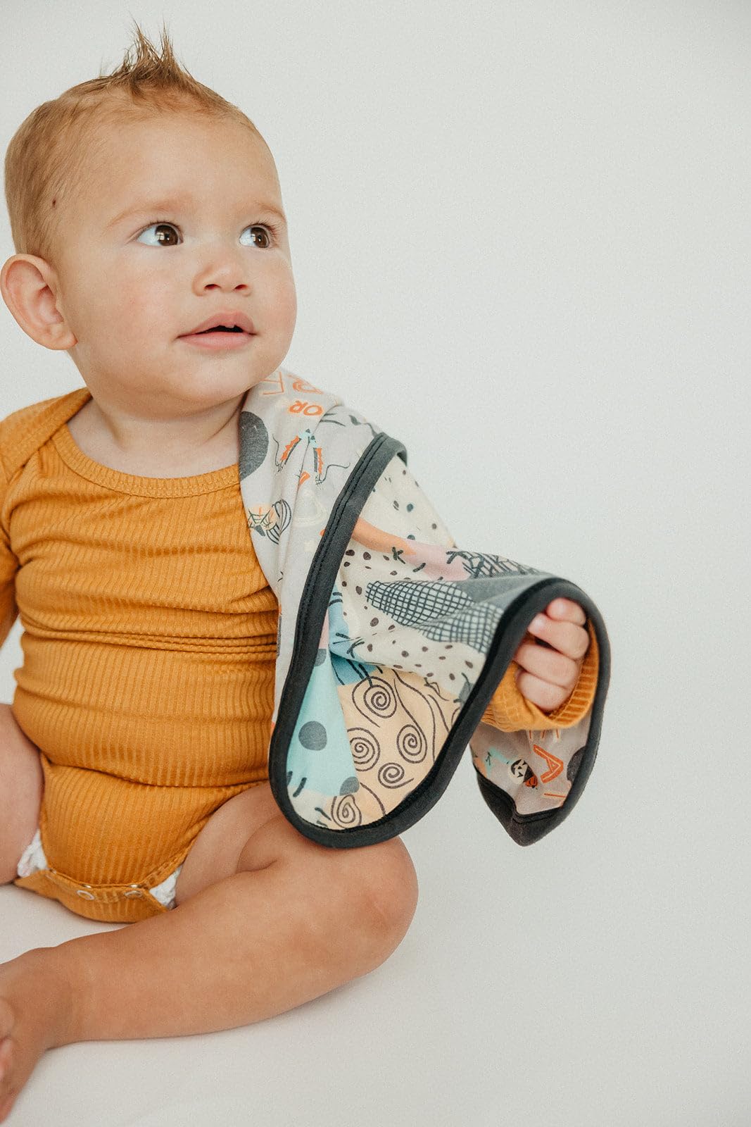 16x16 inch compact design, ideal for diaper bags.