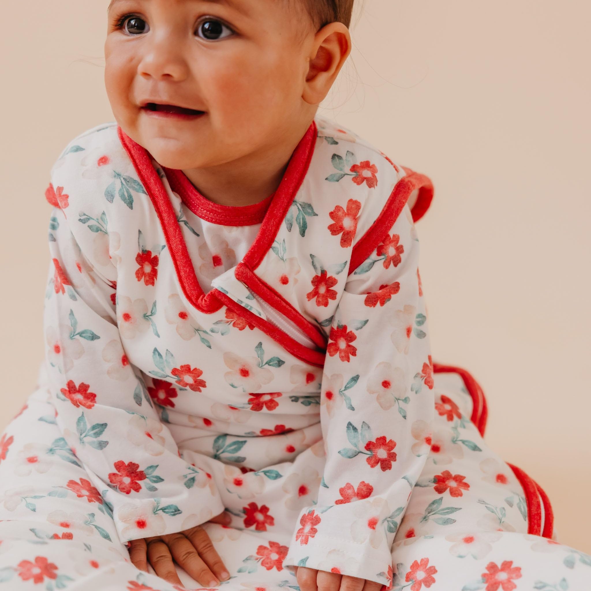 Baby in Noel sleep bag enjoying cozy night routine