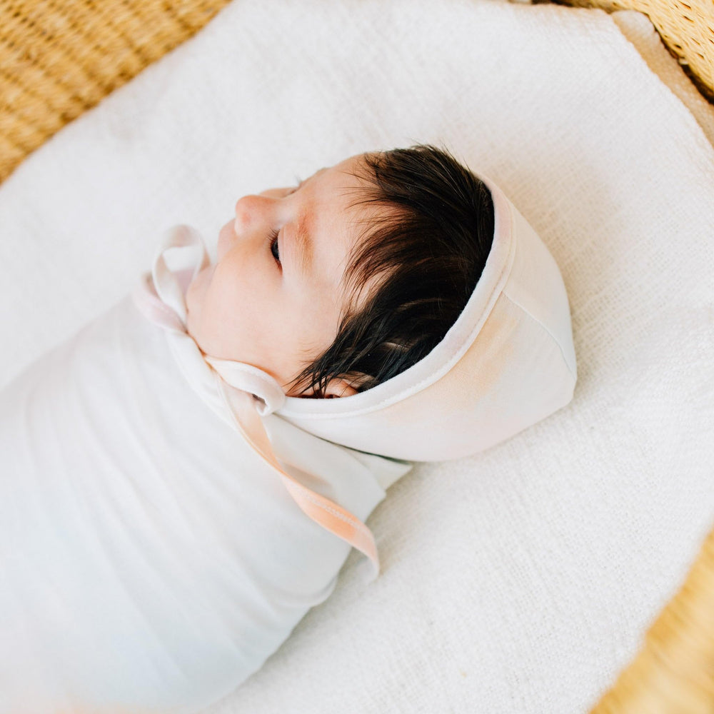 Copper Pearl Nova swaddle gift-ready 46x46 makes a thoughtful newborn gift.