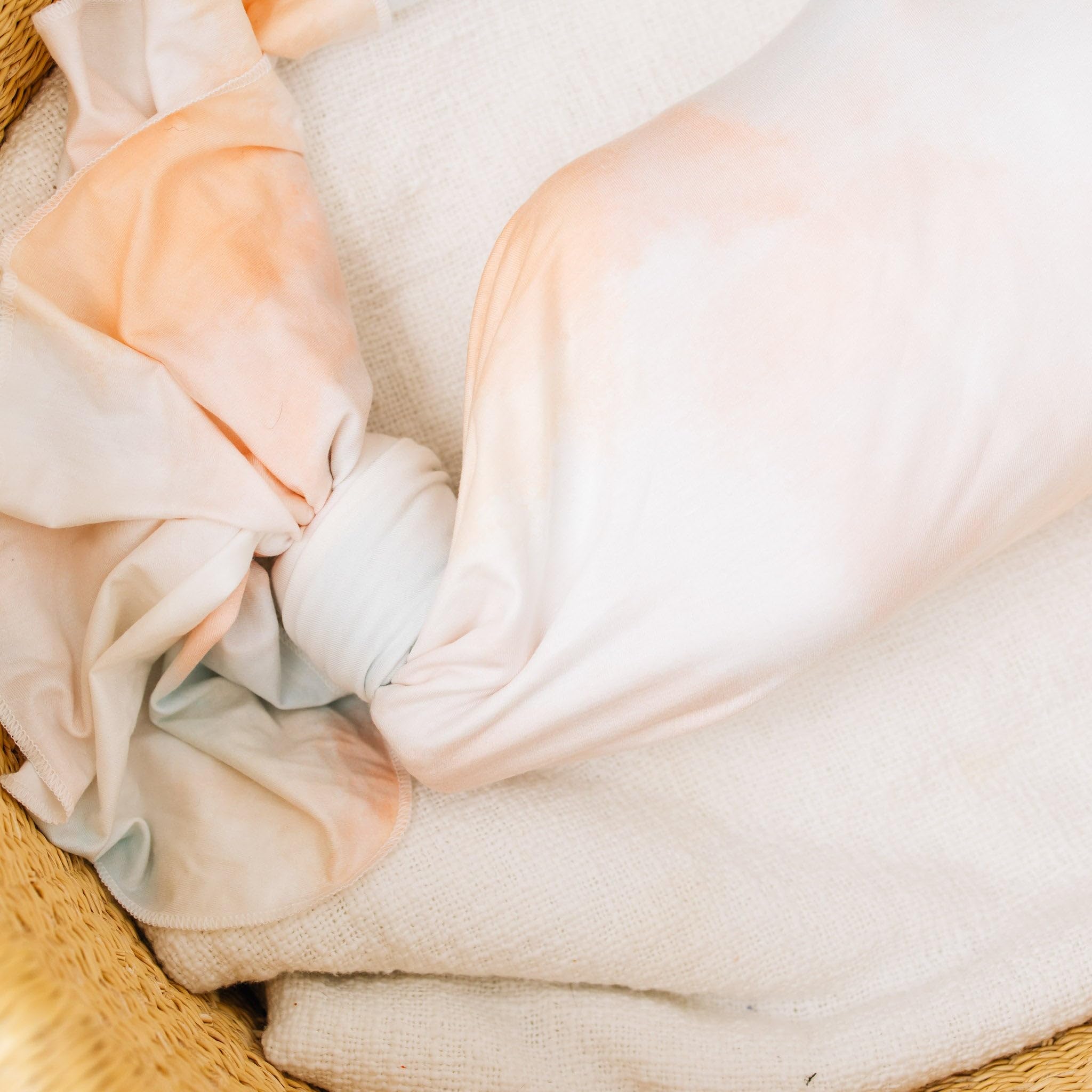 Copper Pearl Nova swaddle lightweight breathable 46x46 keeps baby comfortable.