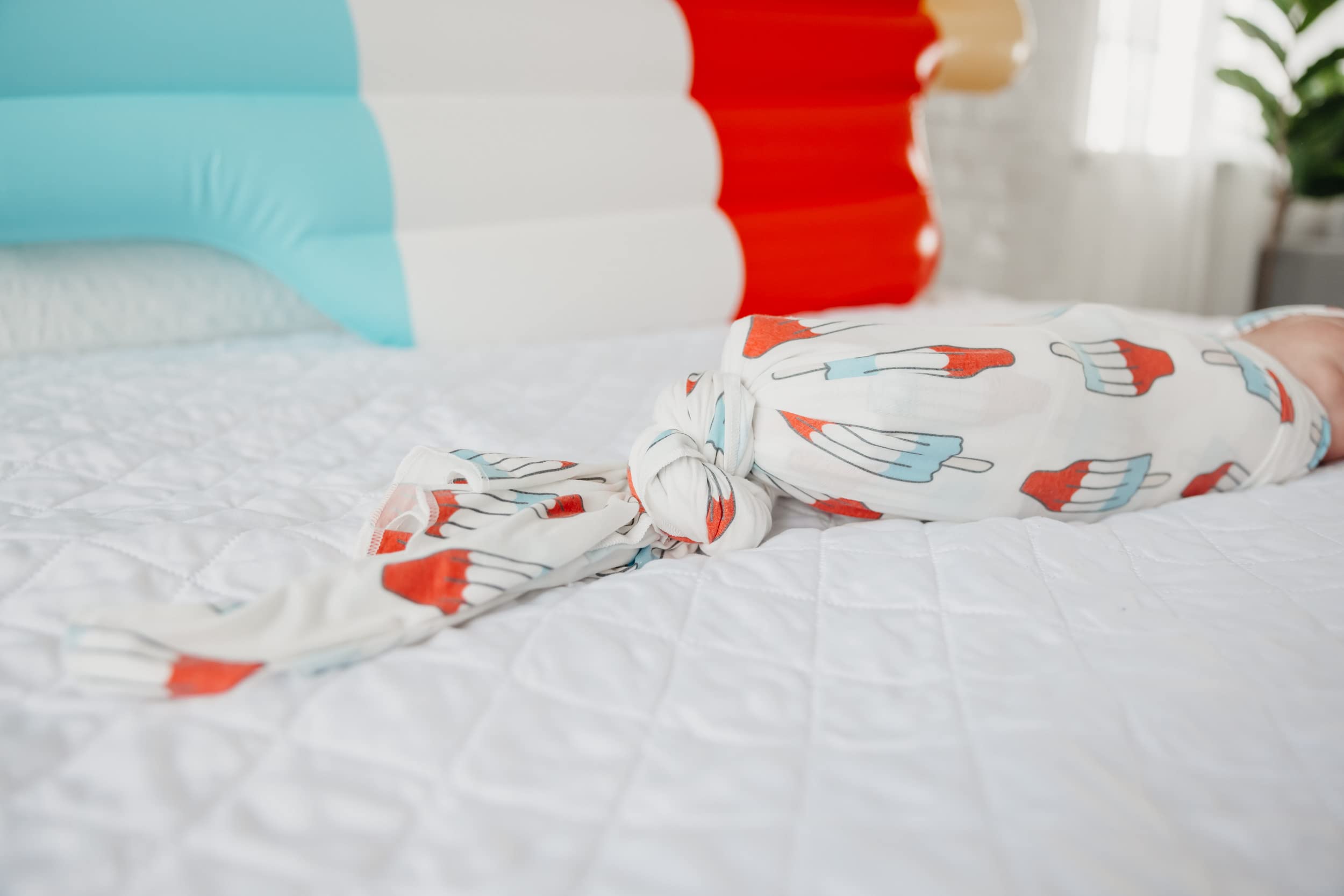 Copper Pearl nursing-cover-blanket supports easy feeding while keeping baby comfortable.