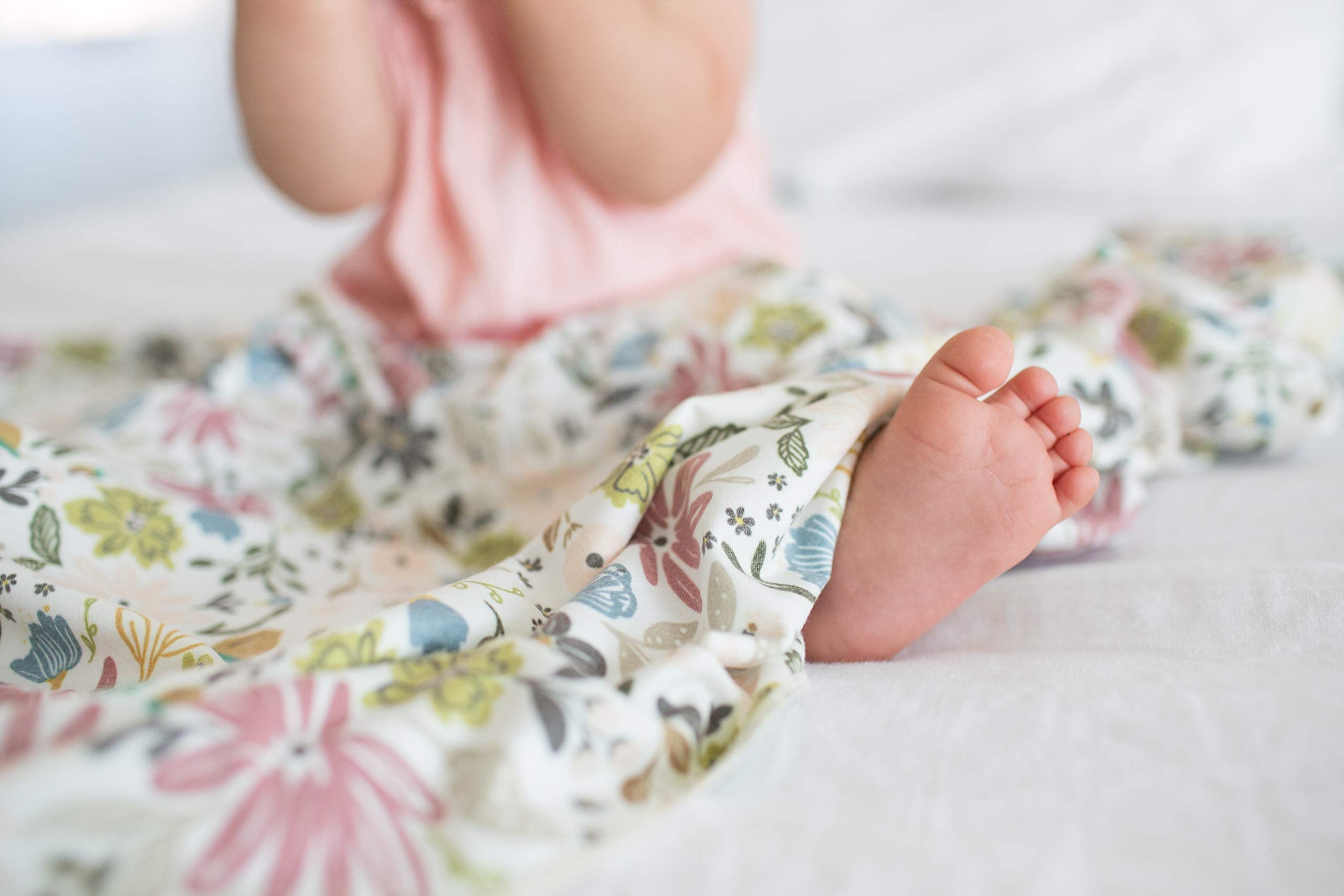 Copper Pearl olive blanket in stroller, lightweight design for travel and daily use.