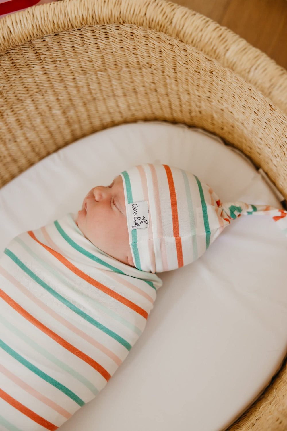 Copper Pearl swaddle gift-ready packaging ideal for new moms.