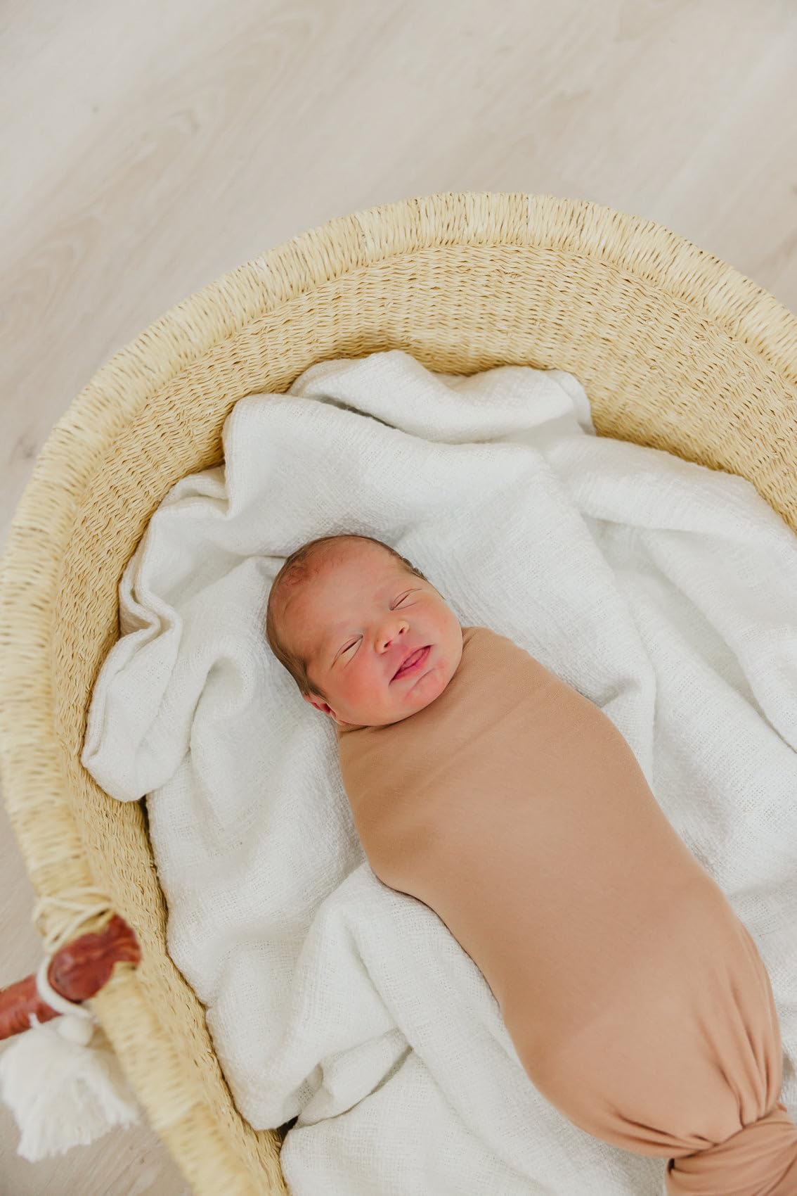Copper Pearl pecan swaddle blanket used as nursing cover on the go.