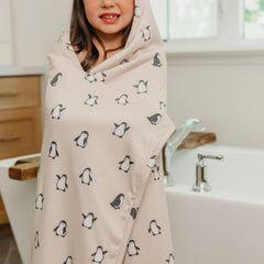 Copper Pearl Penguins towel interior terry cloth offers high absorbency.