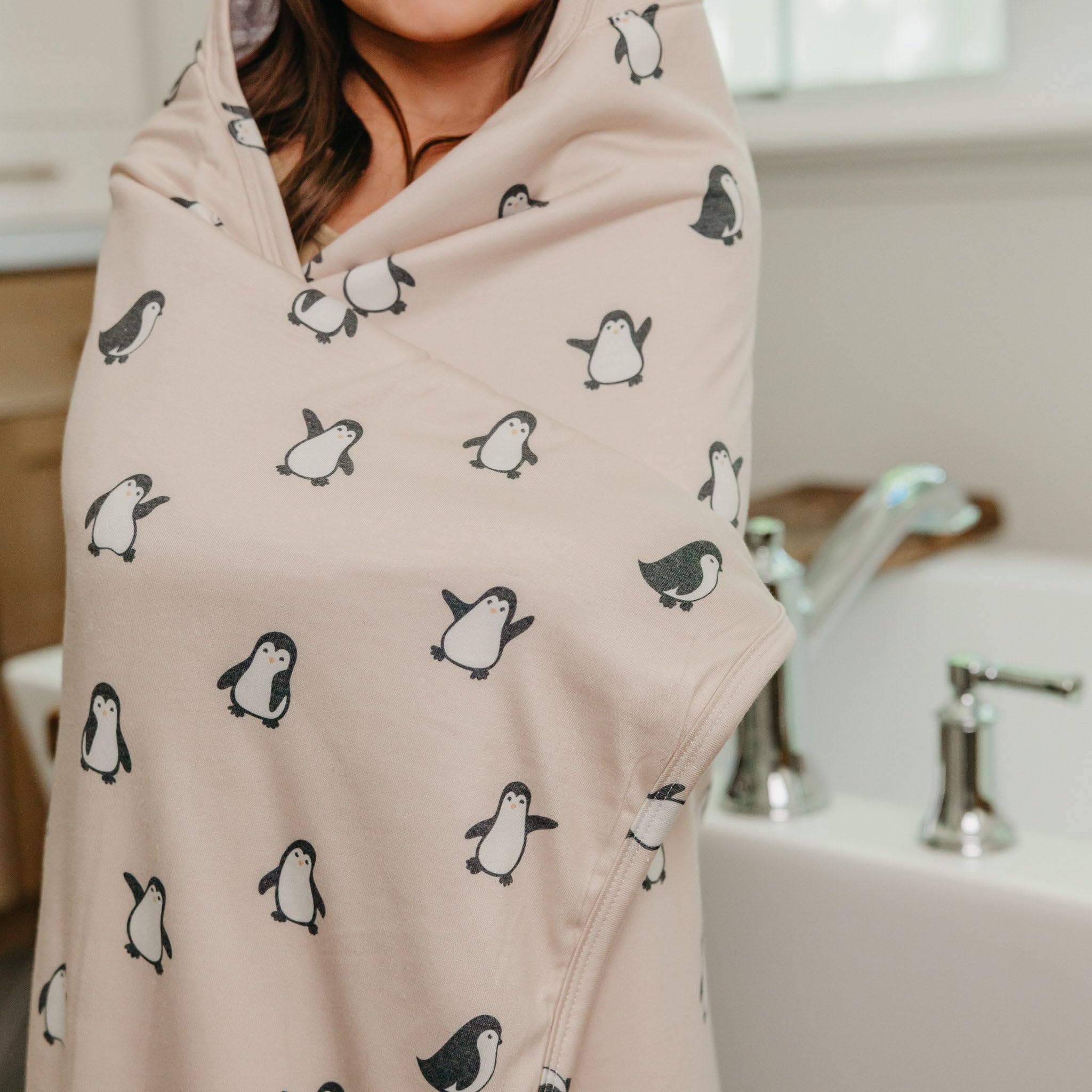 Copper Pearl Penguins large 50x29.5 inch towel ideal for ages 4+.