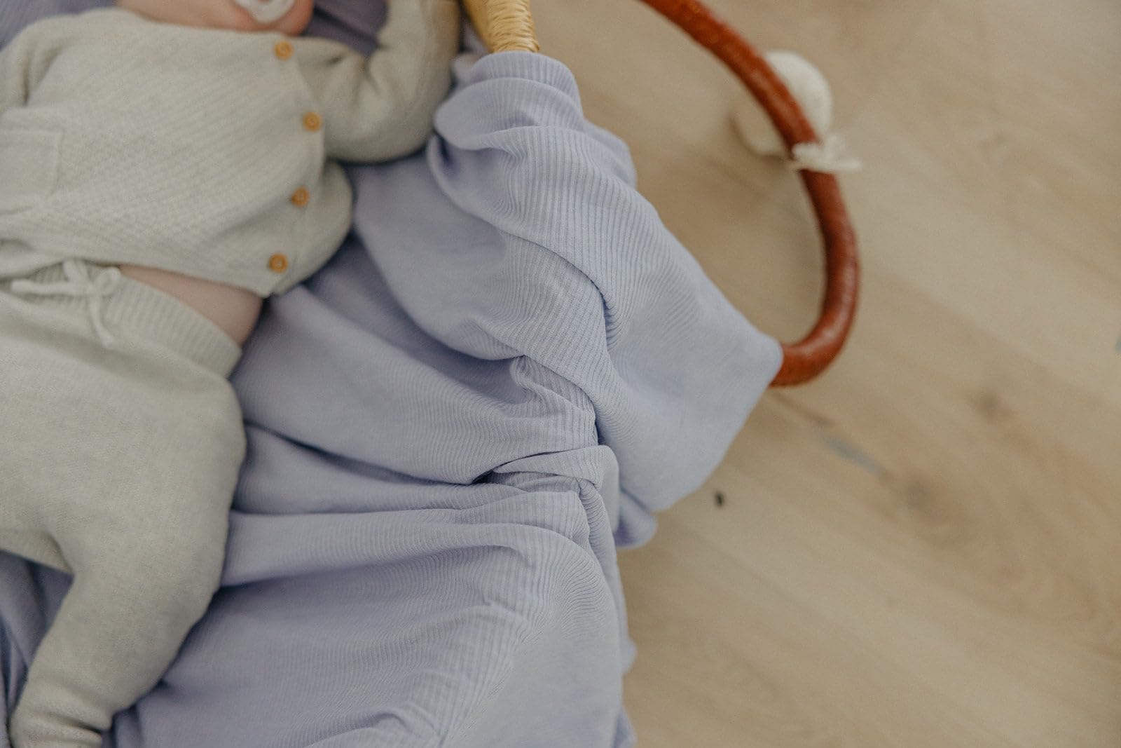 Copper Pearl Periwinkle swaddle serves as nursing cover for discreet feeding