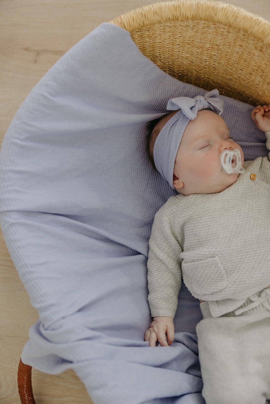 Copper Pearl Periwinkle swaddle used as stroller shield during outings