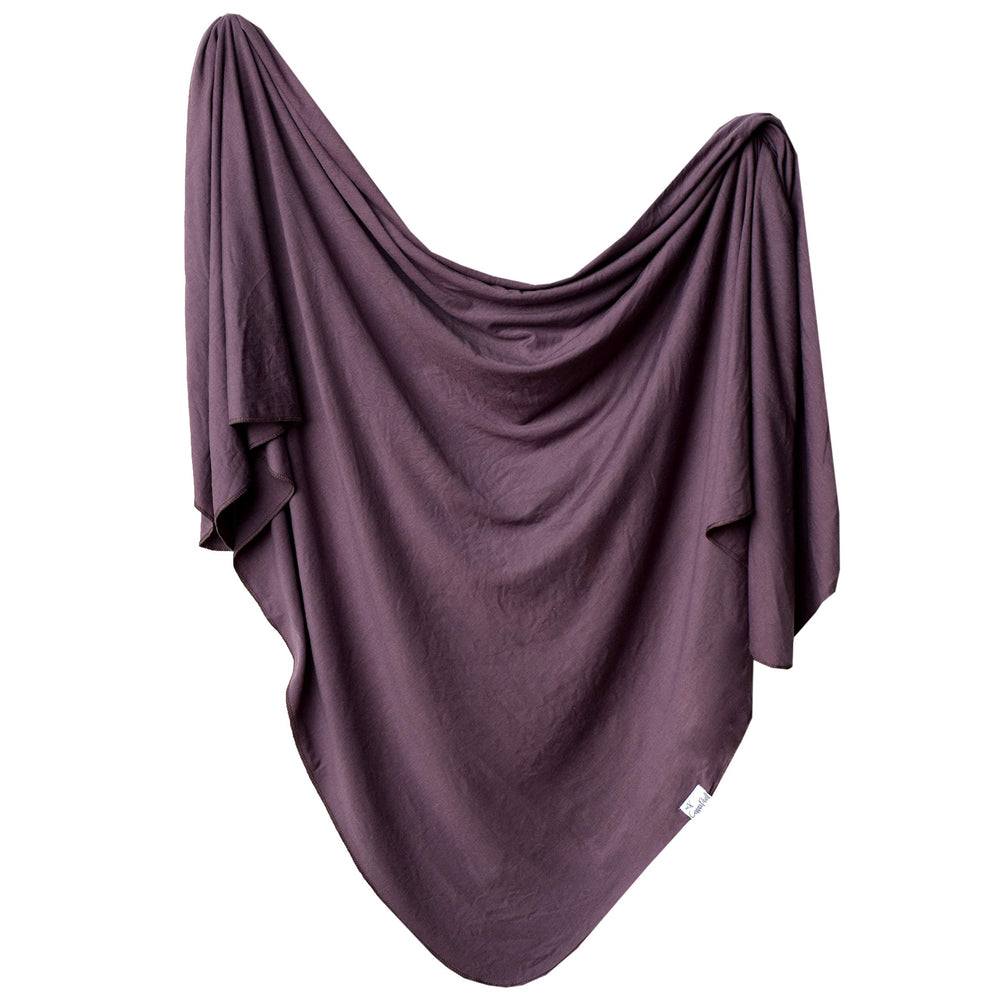 Copper Pearl plum swaddle blanket offers soft texture for cozy newborn moments.