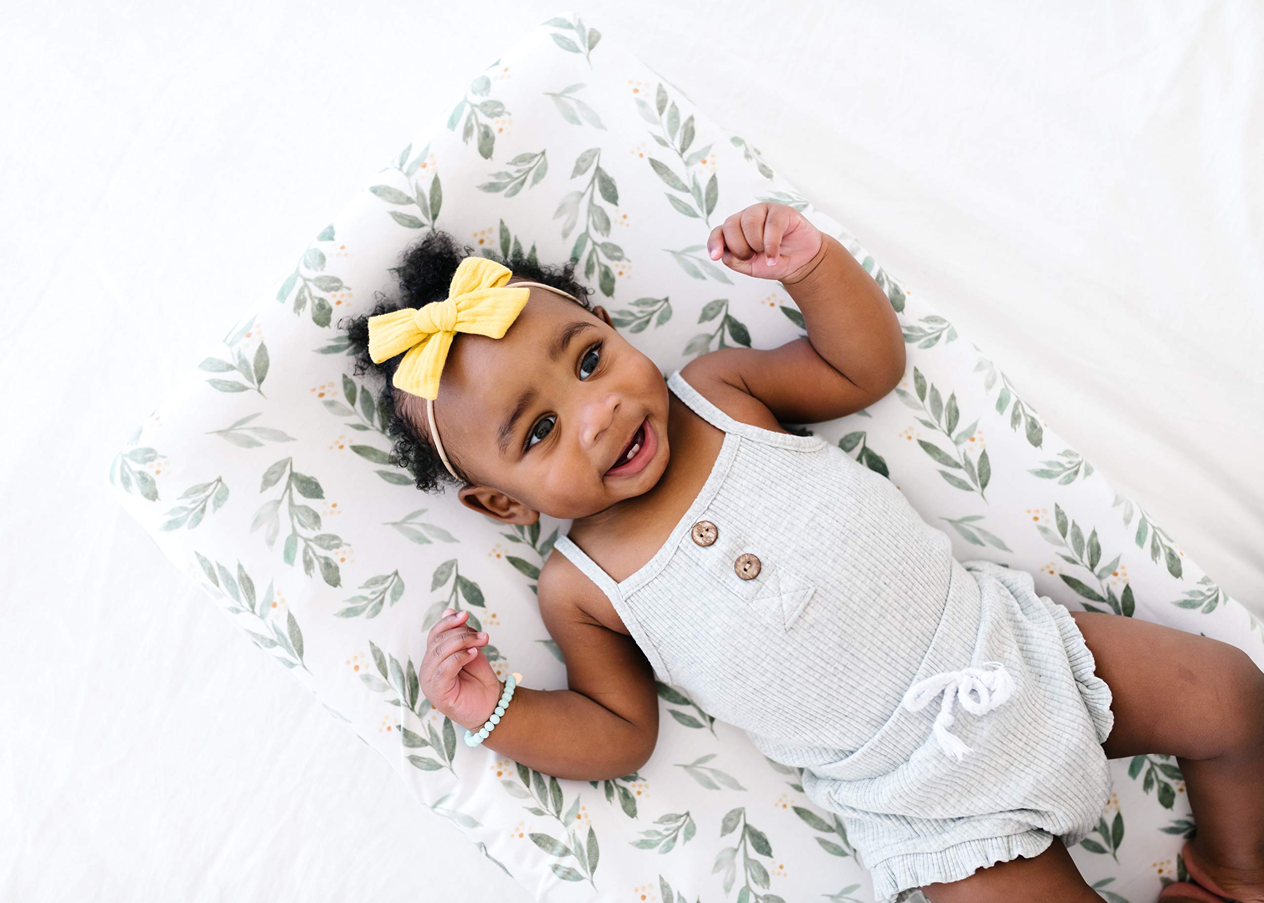 Copper Pearl Fern changing pad cover in a nursery setting with trendy design