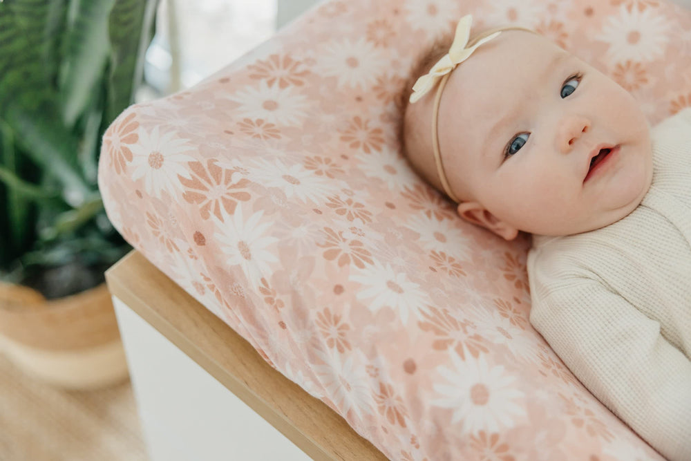 Gift-ready packaging highlights Copper Pearl changing pad cover as a thoughtful baby shower gift