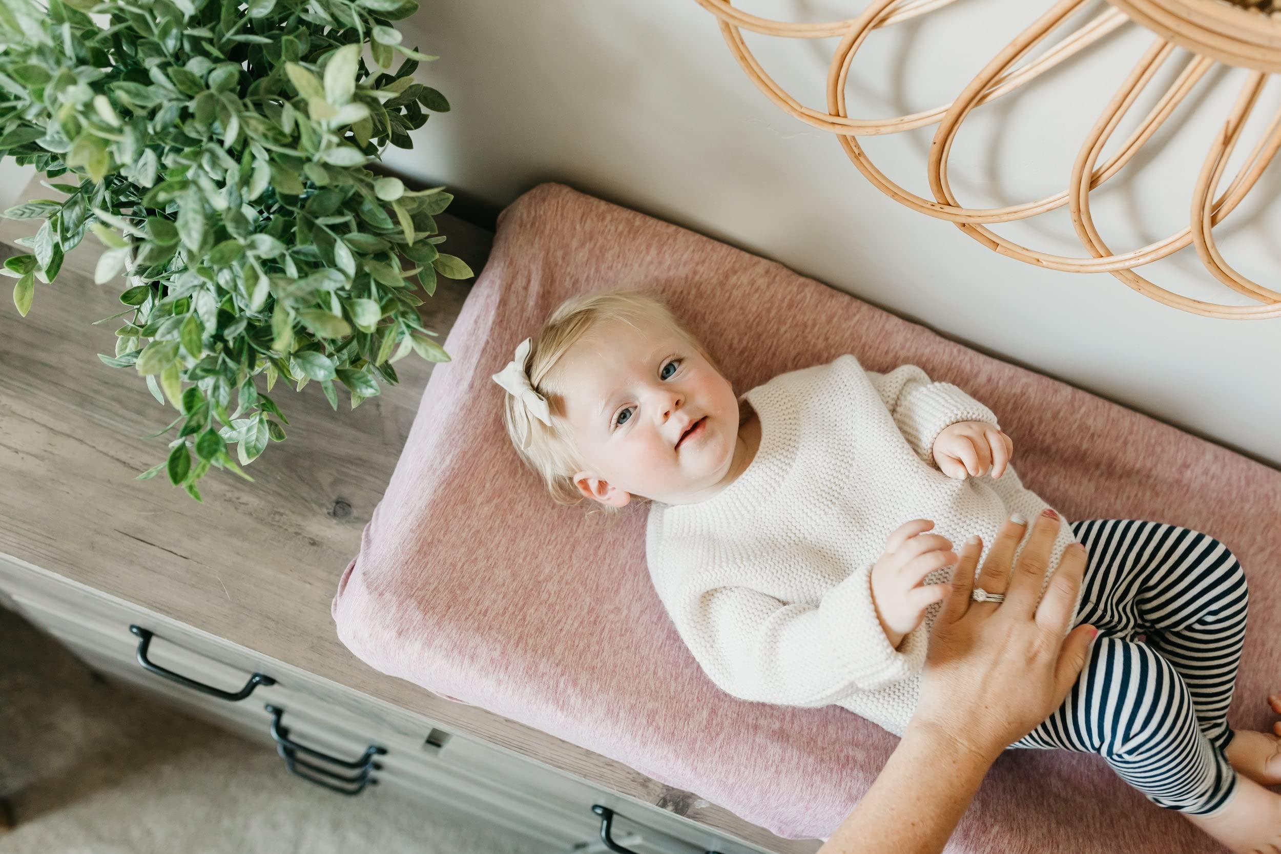 Copper Pearl changing pad cover stays soft and vibrant after repeated washes.