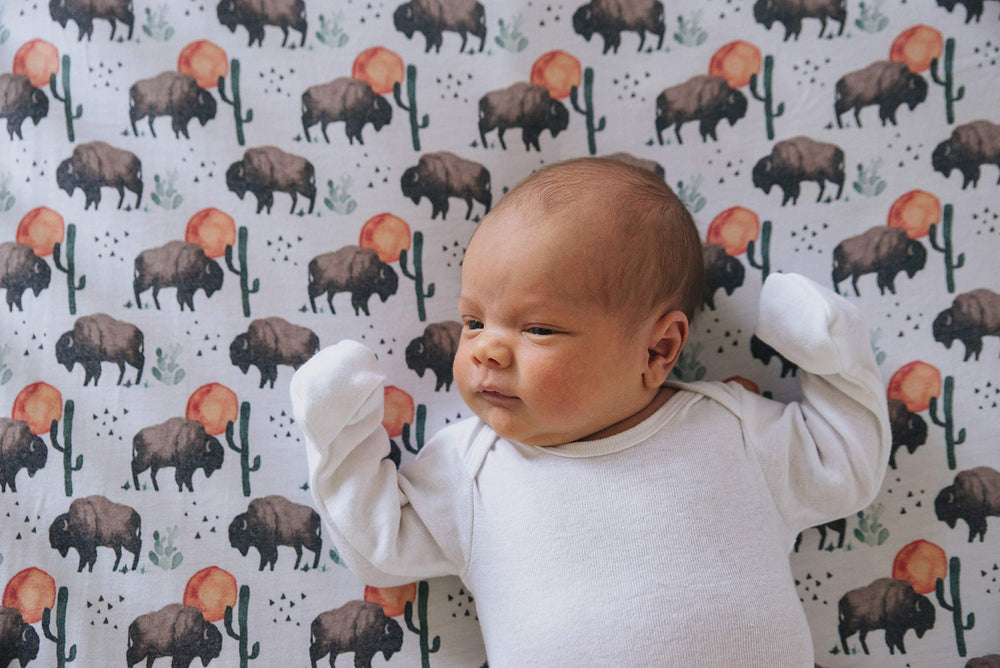 Copper Pearl premium knit crib sheet arrives in gift-ready packaging