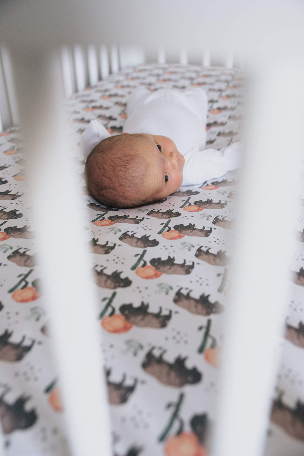 Copper Pearl premium knit crib sheet offers lightweight, breathable fabric for warm nights