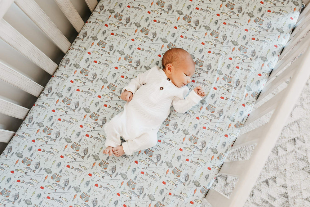 Copper Pearl folded sheet shown beside coordinating nursery items
