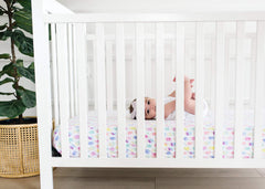 Copper Pearl packaging shows a ready-to-gift crib sheet for baby showers and registries